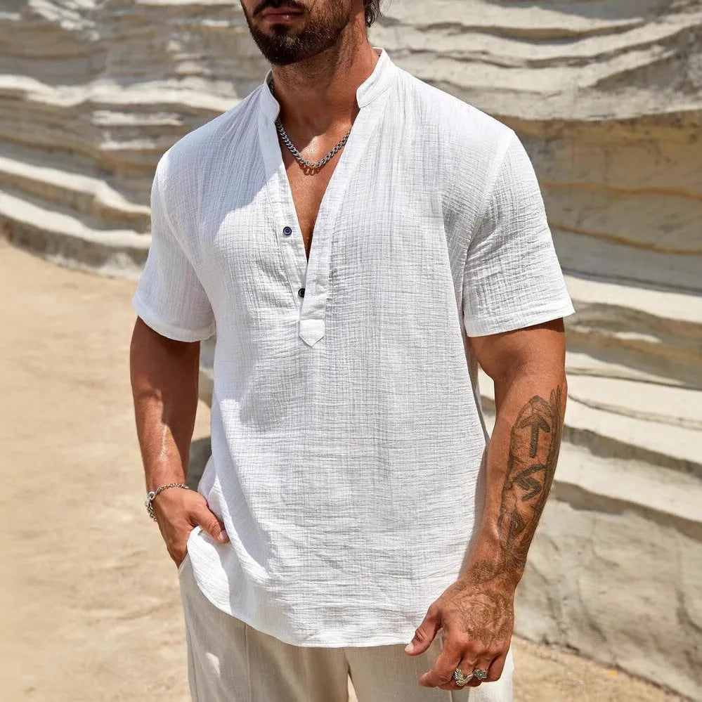 Men's solid colour short sleeve casual shirt with stand collar in a light blue shade.
