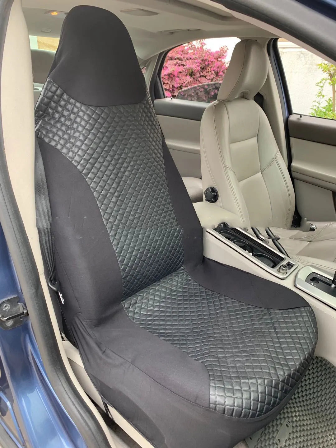 Black quilted automotive seat cover with universal fit for car protection