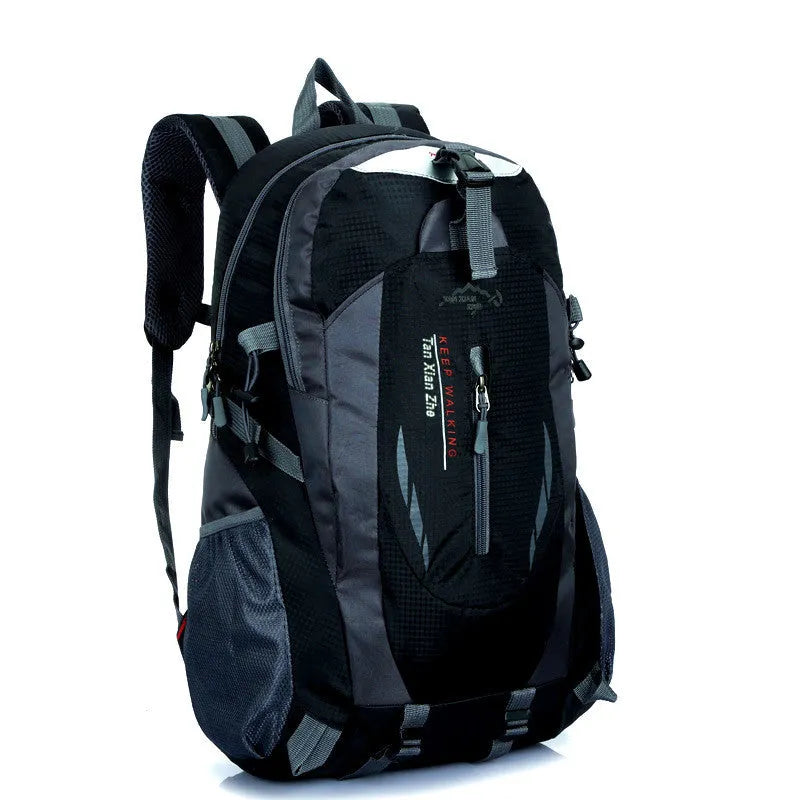 Large red Oxford cloth travel backpack with double straps, showing front compartment and buckle closure.