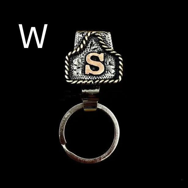 Handmade stainless steel cow tag belt key holder with engraved number plate on a split ring.