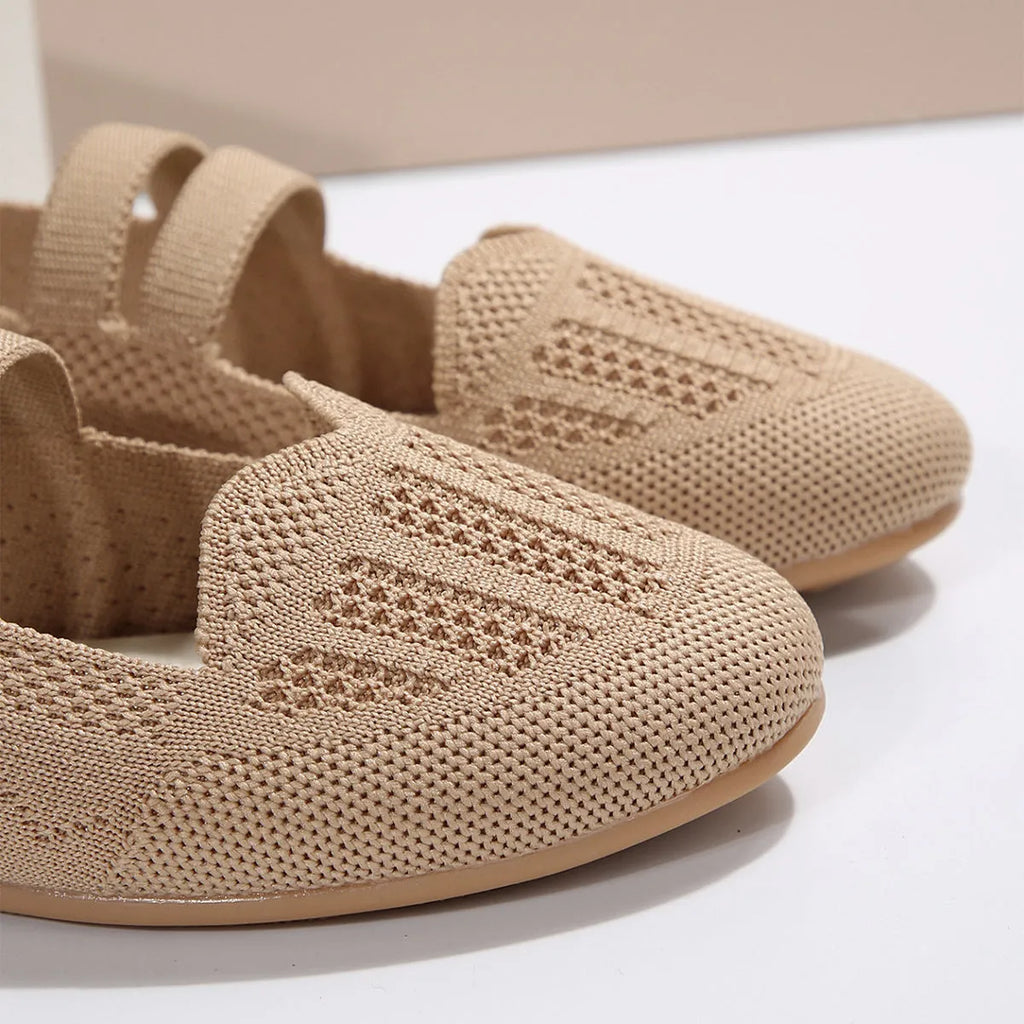 Women's casual mesh slip-on flats in black with round toe, flat heel, and breathable upper