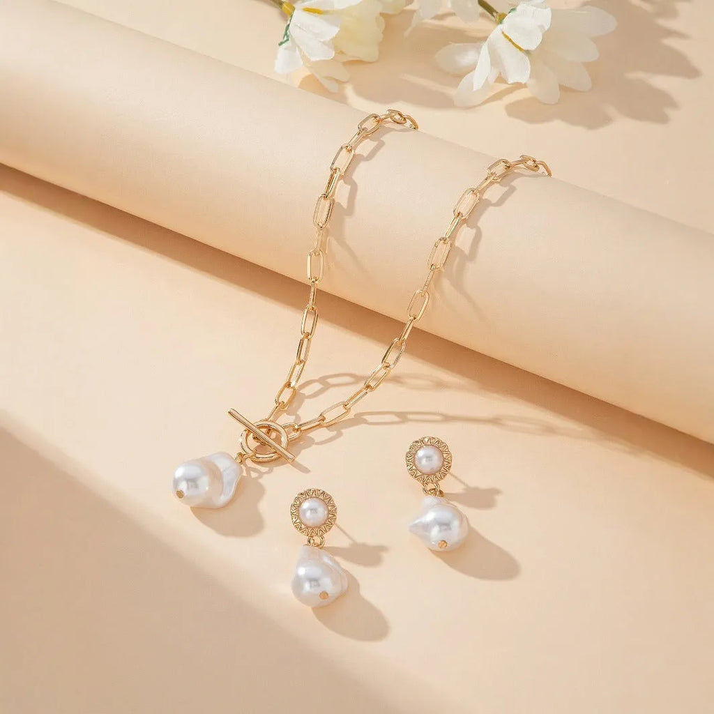 Gold-coloured baroque pearl necklace and earrings two-piece jewellery set