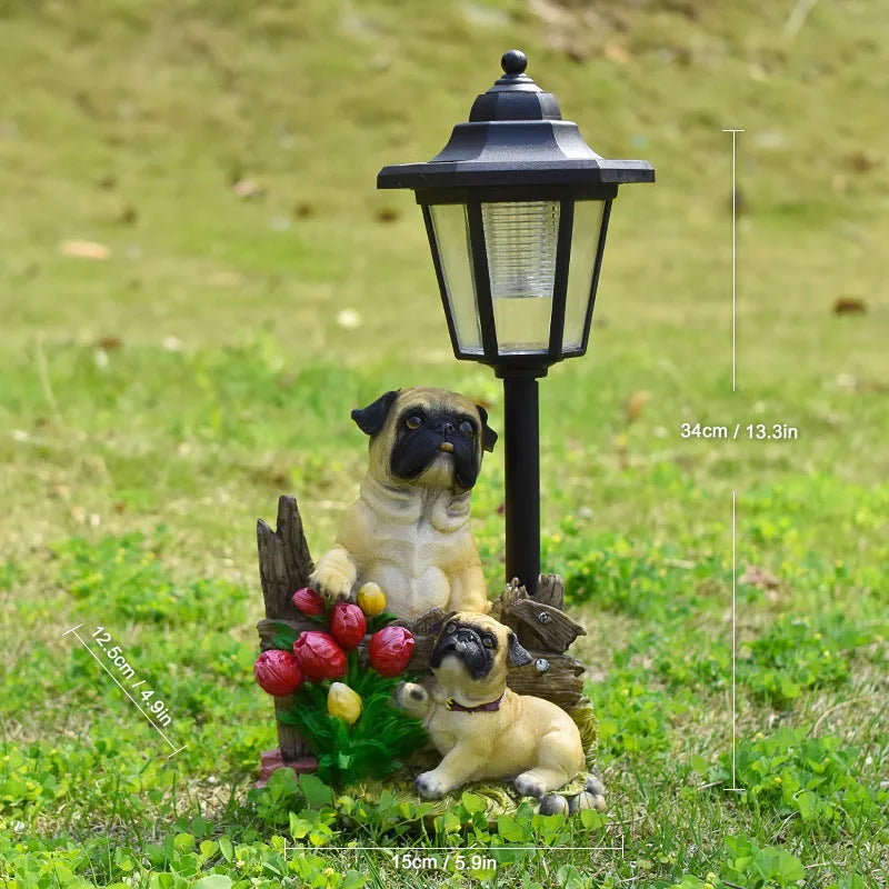 Solar hexagonal garden lamp with decorative resin figurine on plastic base for outdoor pathway lighting
