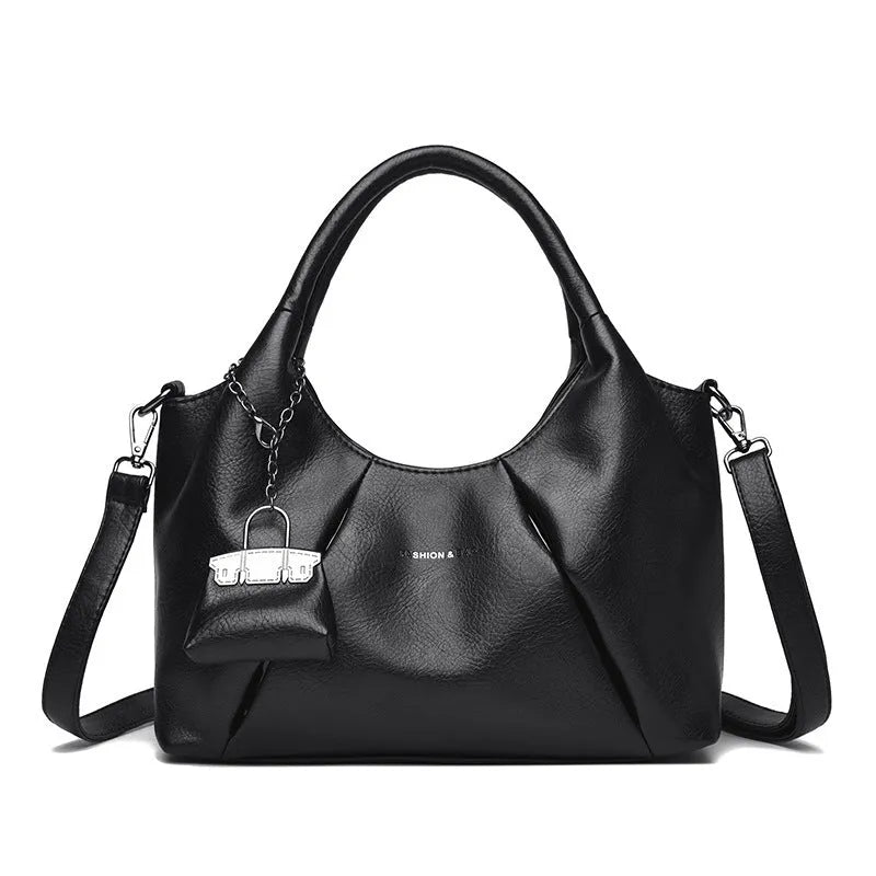 Trendy niche women's new shoulder bag in genuine leather with dumpling shape and pleated detail, khaki colour