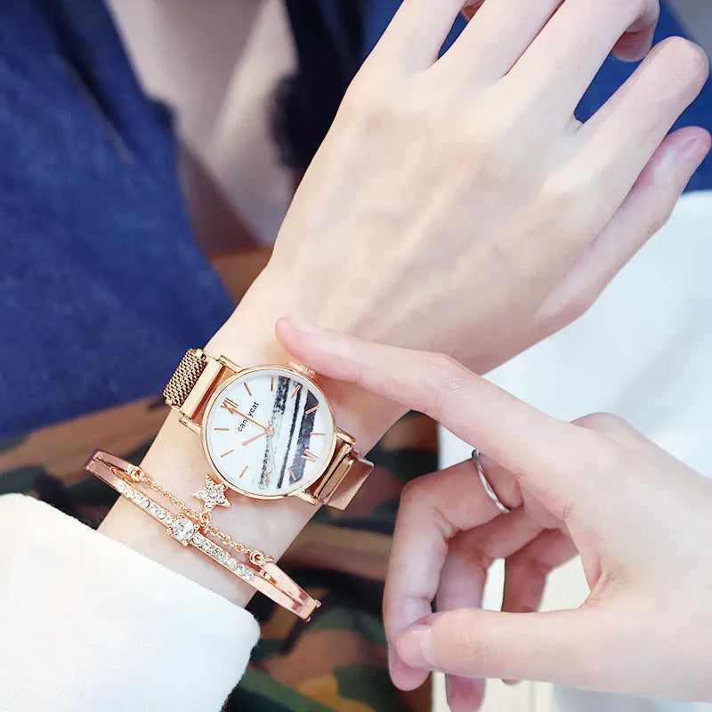 Women's retro marble watch with 32mm round dial, alloy strap, and titanium case back on white background