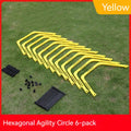 Set of six foldable yellow hexagon plastic agility training rings for sports drills.