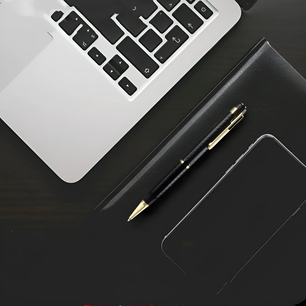 Black pen-shaped digital voice recorder with zinc alloy casing shown next to its accessories.