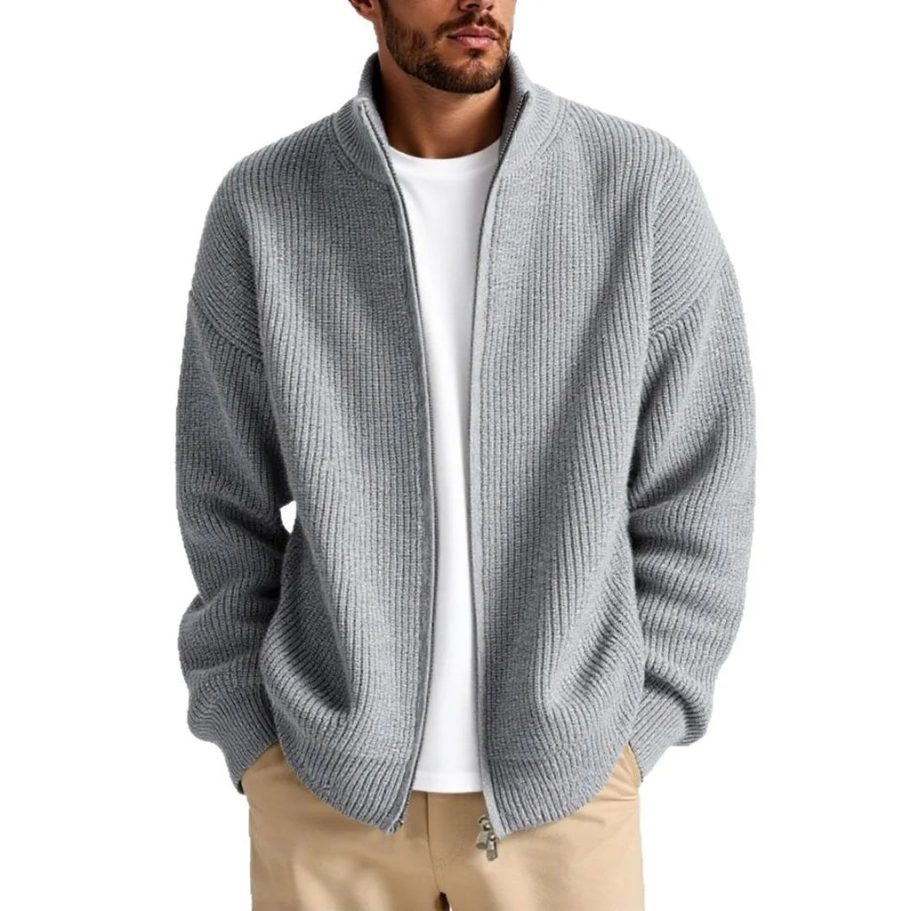 Loose-fit grey men's cardigan sweater on a hanger, front view.