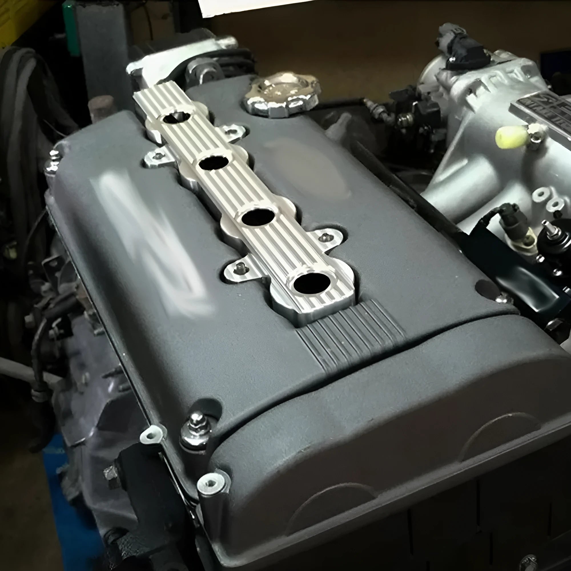Aluminium alloy engine hood in blue, red, or silver, showing versions with and without mounting holes.