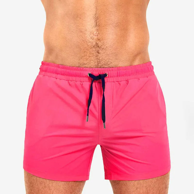 Mesh lining swimming sports shorts in polyester fabric available in six solid colours