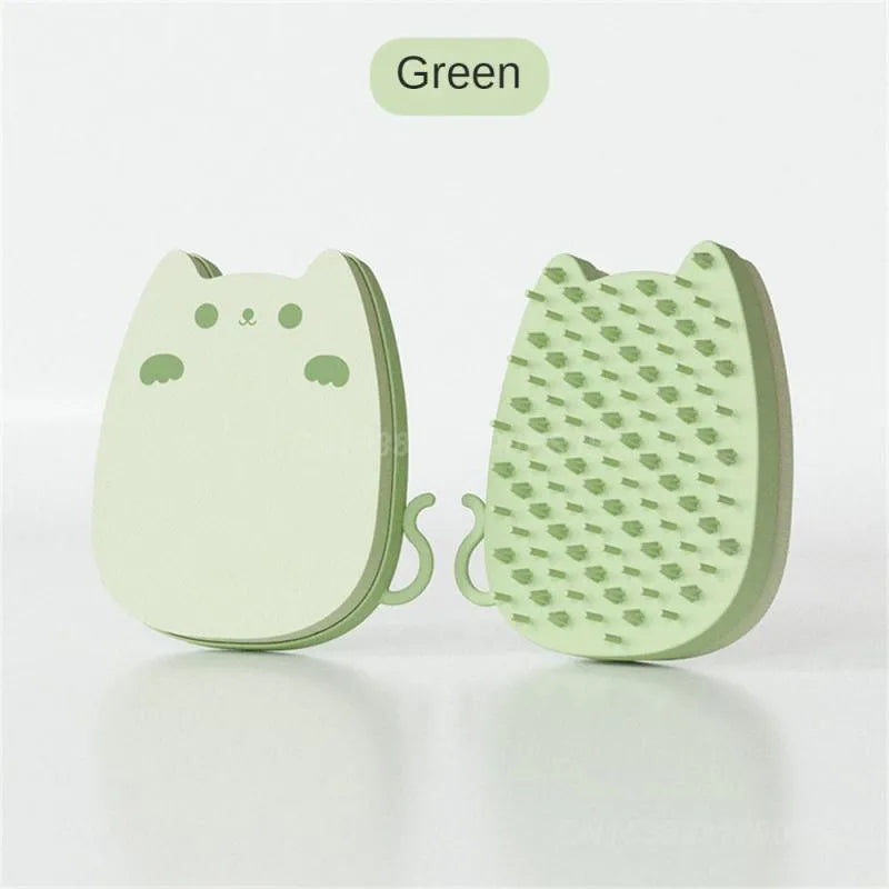 Blue silicone sponge pet grooming brush with two types of comb teeth on a white background.