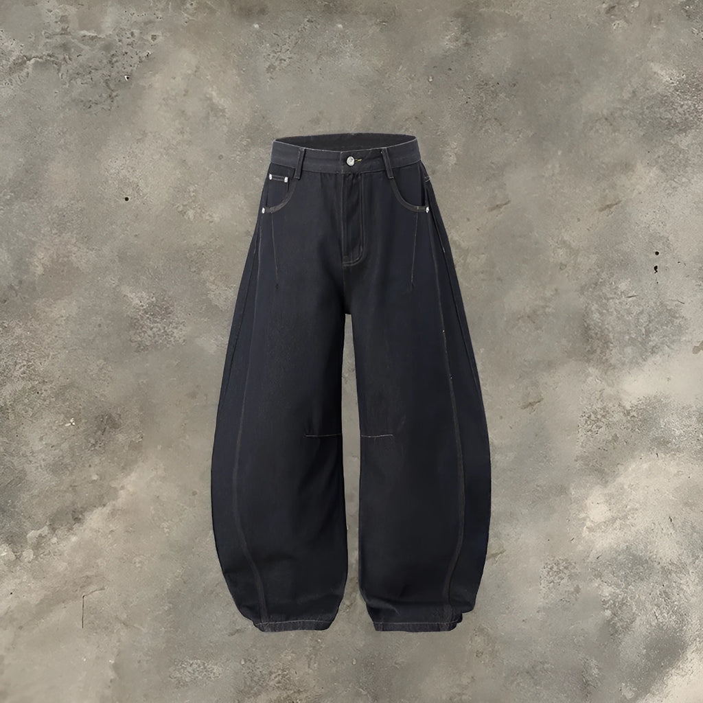Men's wide leg denim trousers in original cow colour, showing relaxed fit and mid waist design