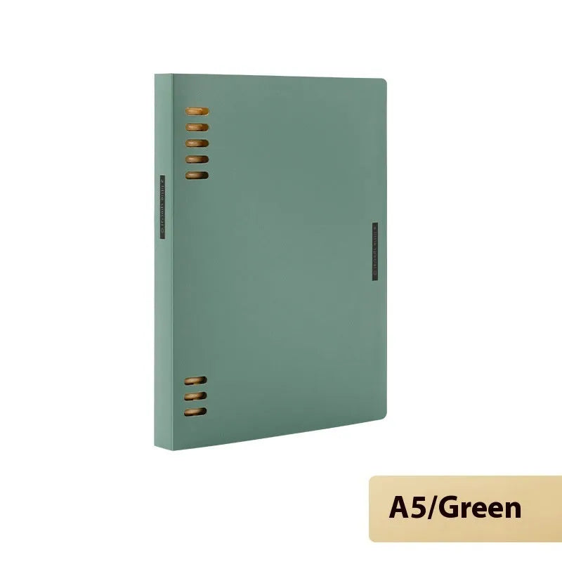 Loose-leaf spiral notebook with PP cover open, showing raw wood pulp pages in A5 or B5 size.