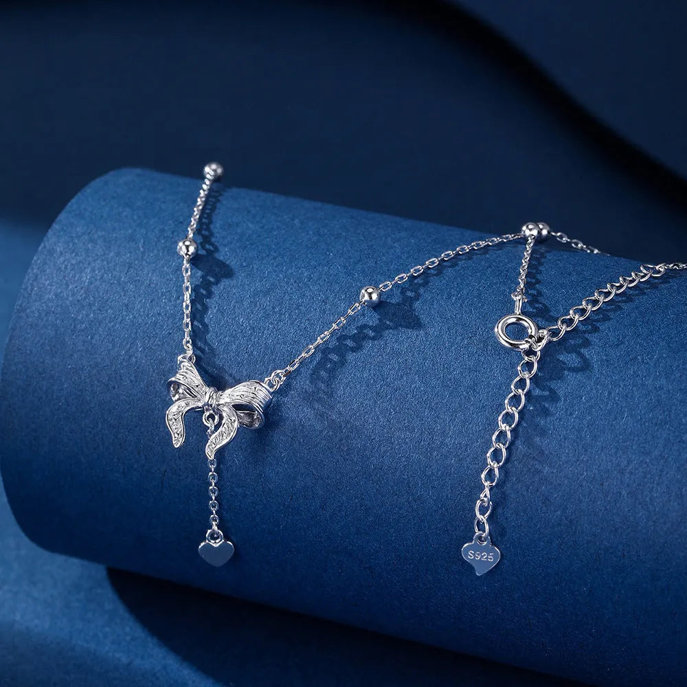 S925 sterling silver necklace with butterfly heart bow pendant on adjustable O-ring chain