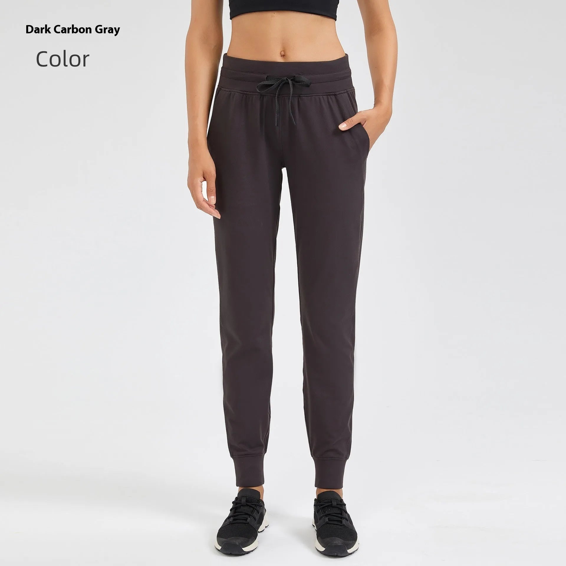 Women's high-waist yoga pants in distilled coffee colour with an elastic drawstring waist for fitness.