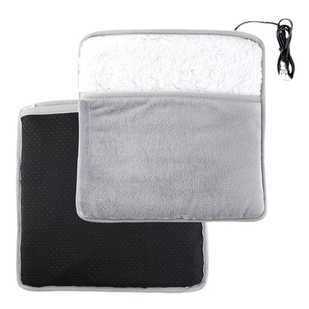 Grey USB heating feet warmer with cord and mechanical switch on floor