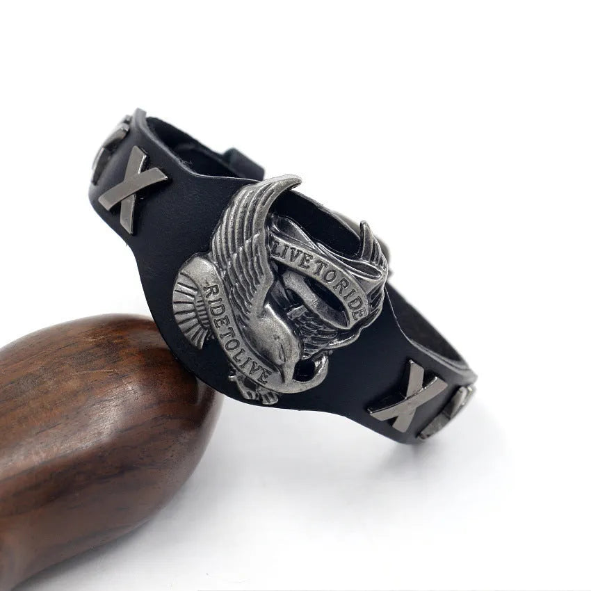 Black leather geometric bracelet with alloy eagle watch clasp showing tapered width and 26cm length