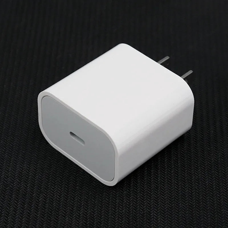 Mobile phone charger with American and European plug versions showing USB port