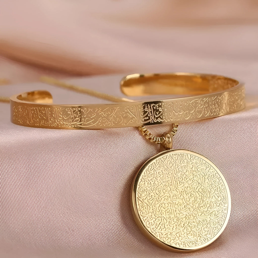 Stainless steel polished disc necklace with engraved Arabic text, gold finish