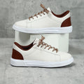 Platform skateboard casual sneakers in beige brown with round toe and cross belt detail