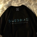 Loose fitting cotton short sleeve t-shirt in black, shown on a hanger.