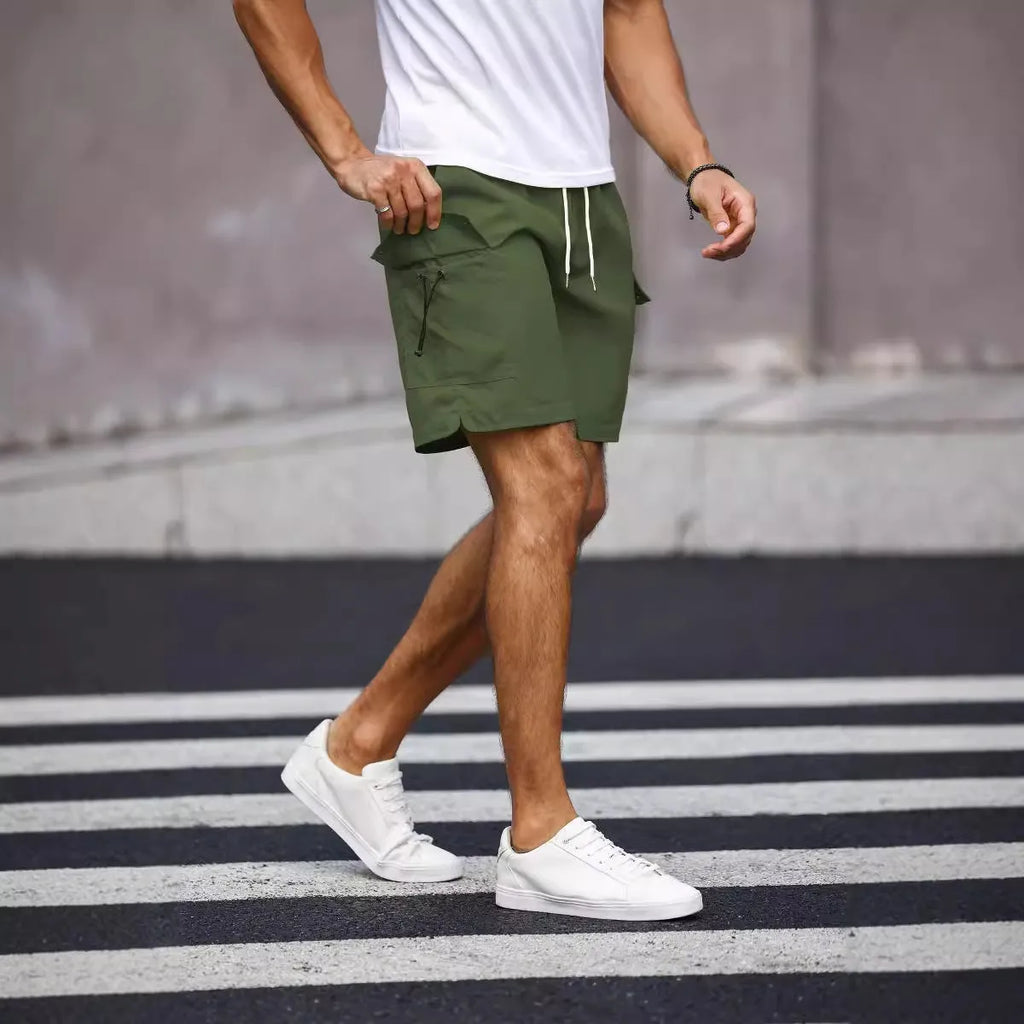 Men's straight-leg workwear shorts in cool silk cotton fabric, available in fluorescent green and army green colours