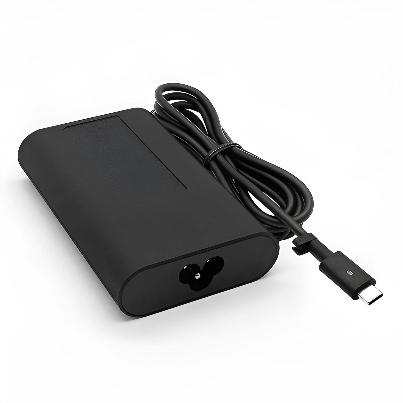 Black 65W USB-C laptop power adapter with a set of international plug cords for UK, US, EU, AU and SA sockets.