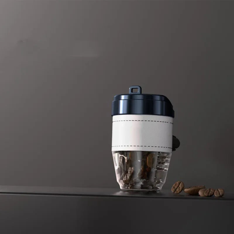 Solid coffee bean car air freshener shaped like a coffee cup on a car dashboard.