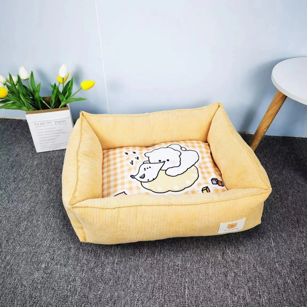 Soft fabric pet winter bed for dogs and cats in light blue colour, showing plush velvet texture.