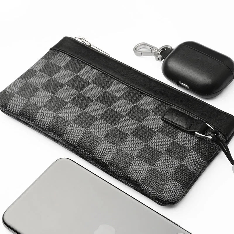 Black men's cowhide leather clutch wallet showing front view.