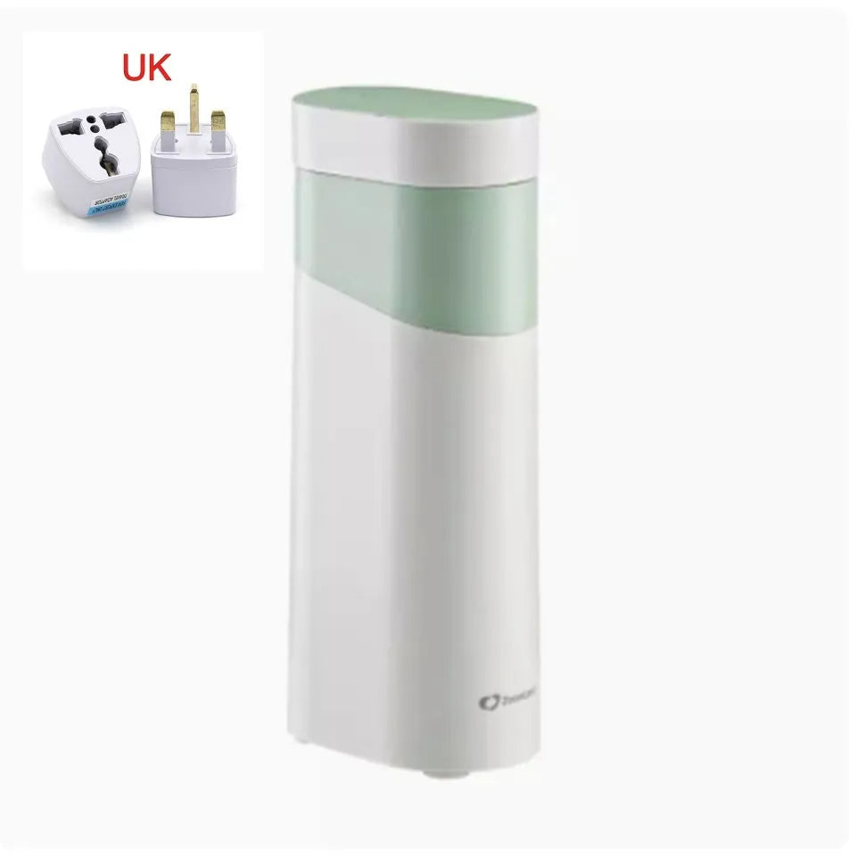 Black and green portable desktop instant water dispenser with digital display and small tank.