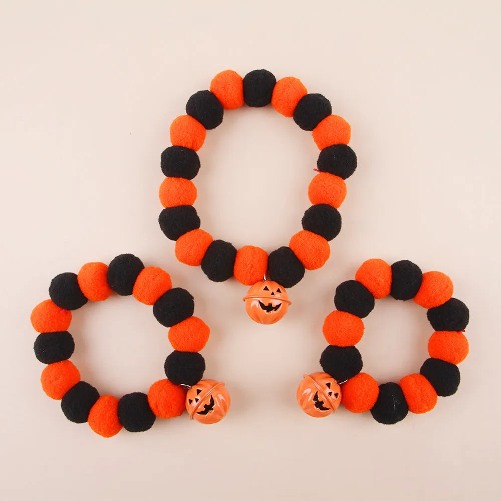 Halloween cat collar with orange pumpkin design and trick or treat text for festive pet costumes