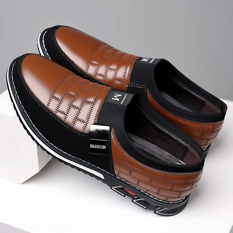 Slip-on men's plus size casual leather shoes in black with round toe and rubber sole