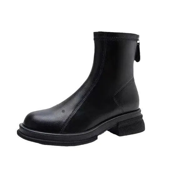 Women's black ankle boot with round toe, thick flat heel, and rear zipper on a rubber sole.