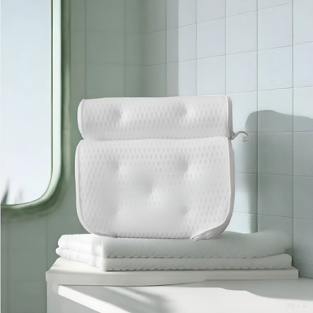 White 4D mesh bathtub pillow with multiple suction cups on a light luxury styled bath mat.