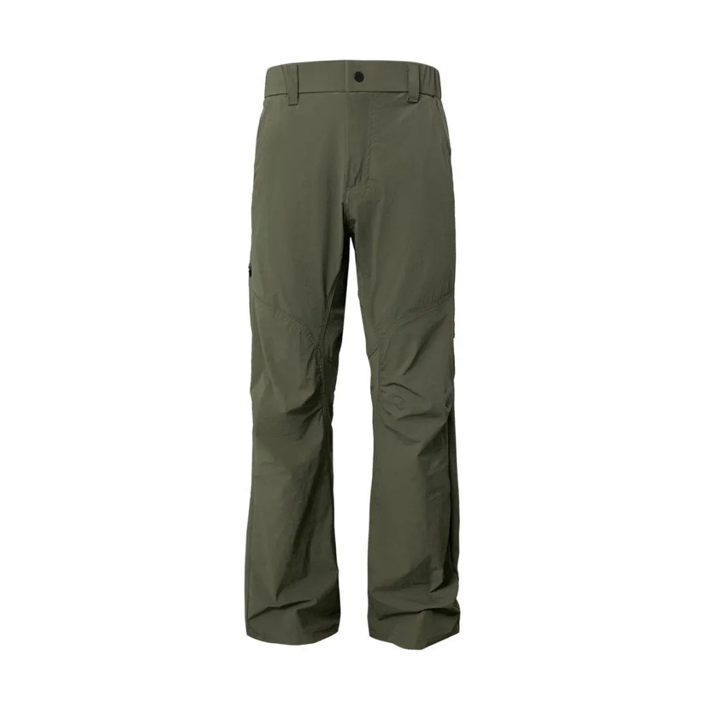 Men's Army Green casual trousers with 3D three-dimensional cutting and a deconstructing design detail on the leg.