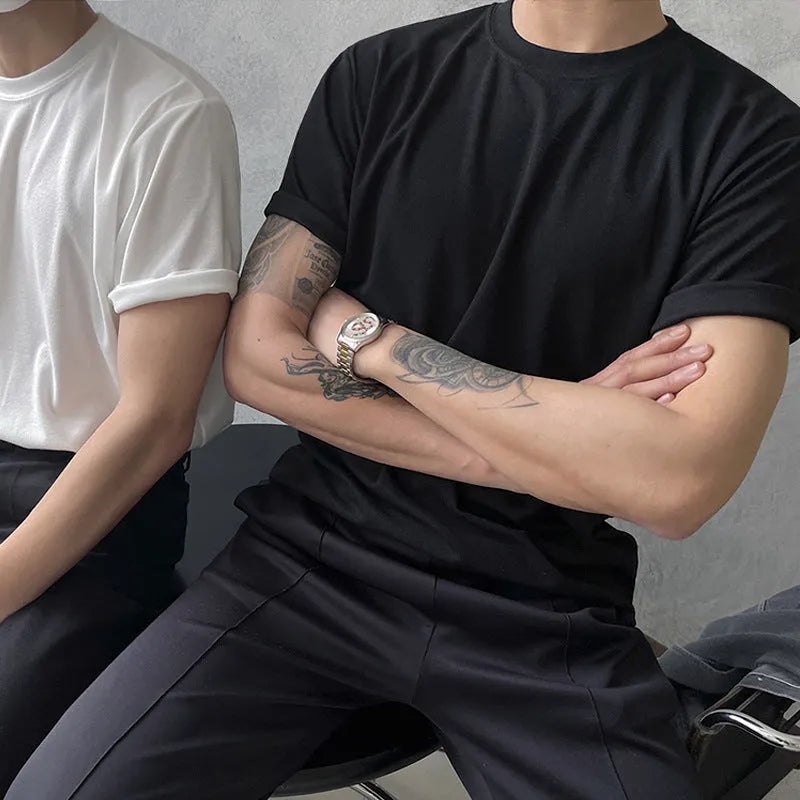 Men's slim fit cotton T-shirt in solid white colour on a hanger.