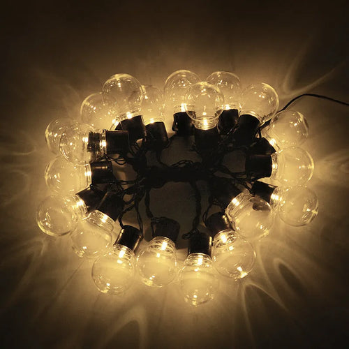 10 metre solar festival light string with 40 bulbs in warm white or clear globe styles on black cable