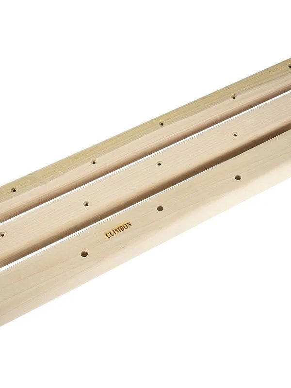 Three solid wooden fingerboards of different lengths for grip and climbing strength training.