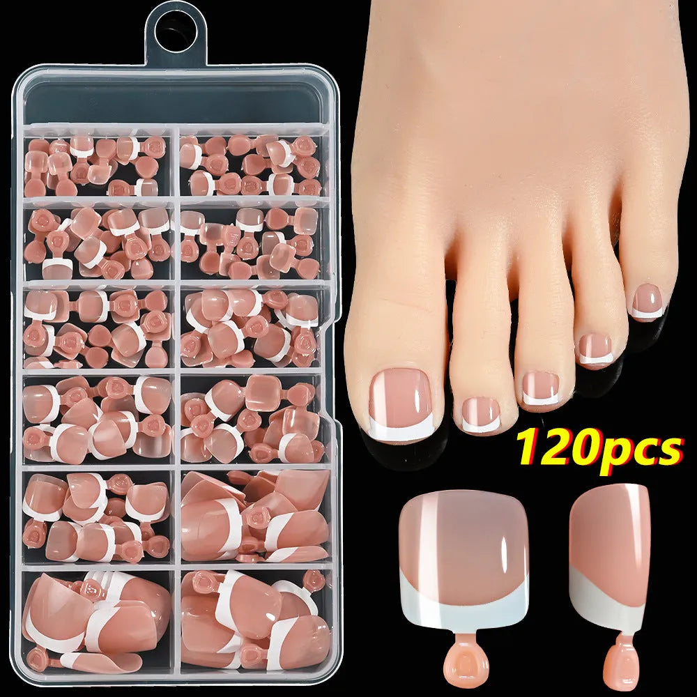 Open box showing 120 French white tip nude square false toe nails in assorted shades.