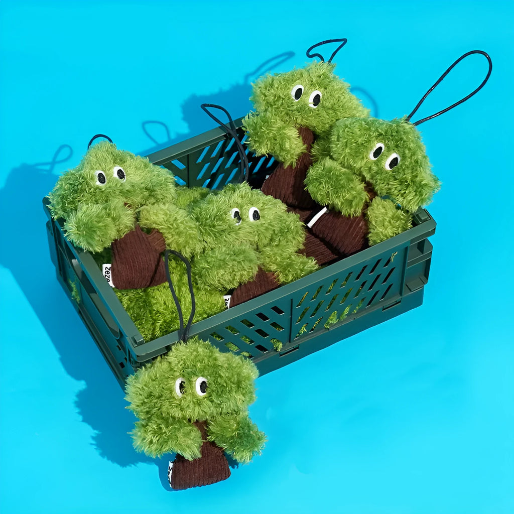 Pine tree shaped cat toy with bag pendant, showing small, medium, and large size options