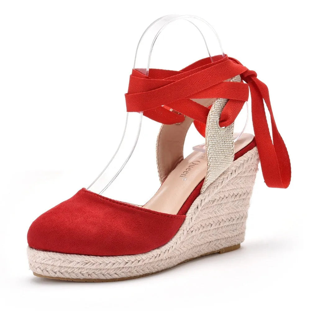 Women's apricot boho wedge sandals with bead and tassel decoration and an adjustable buckle strap.