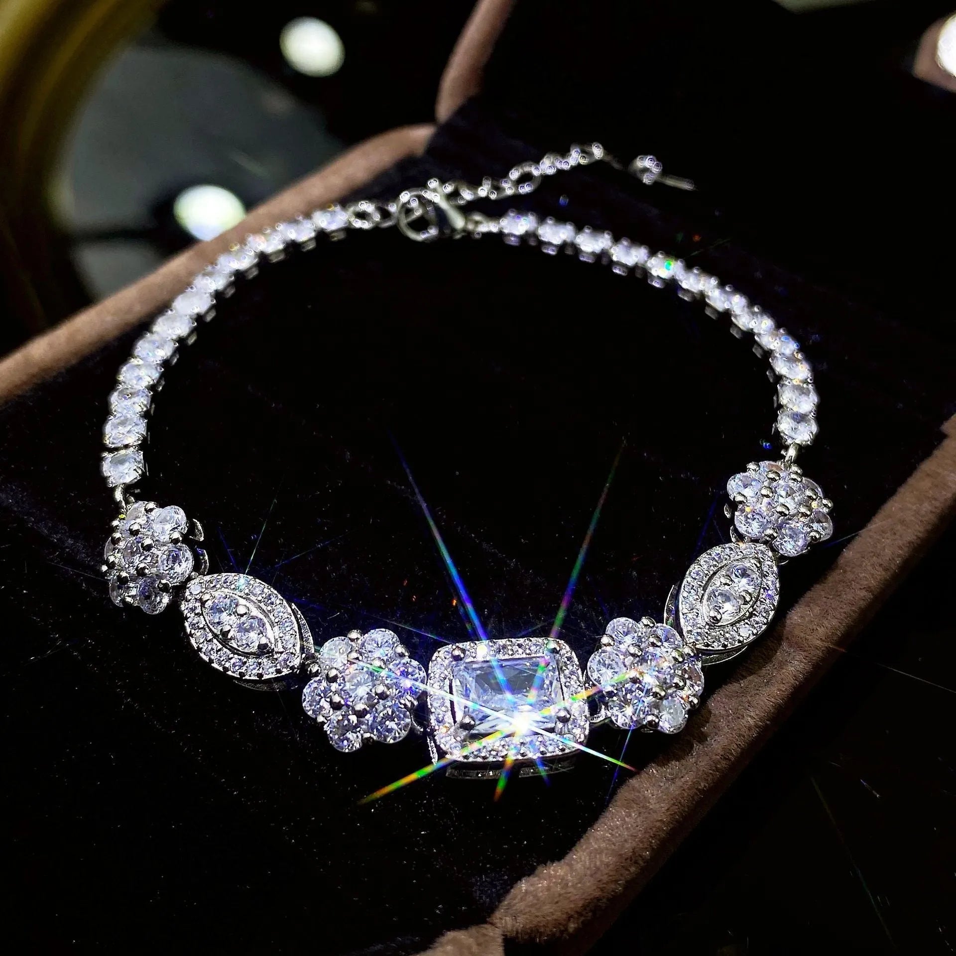 Women's sterling silver plated bracelet with zircon inlaid stones in geometric luxury style