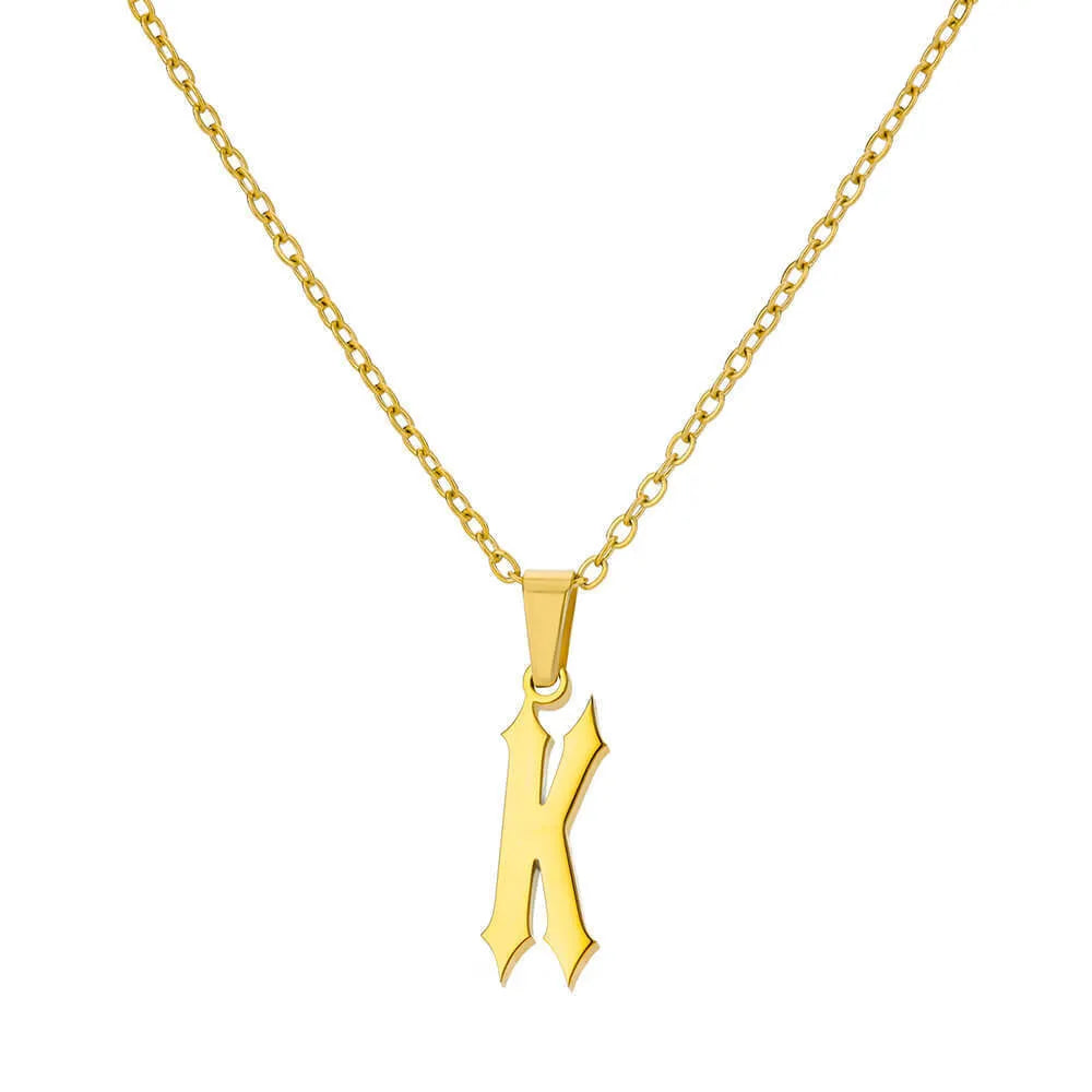 Gold stainless steel ancient English letter pendant necklace with O-ring chain on white background