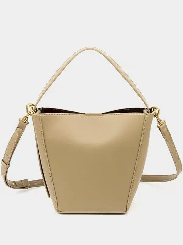 Urban minimalist crossbody shoulder bag in bucket style, PU material, solid colour, three-dimensional outer pocket, available in black, army green, and wine red