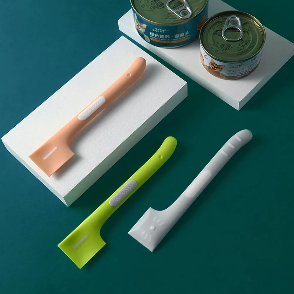 Long green TPR pet food spoon with right-angle head for feeding from tins