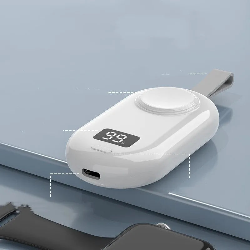 Plastic wireless power bank portable charger showing black and white colour options with dimensions 121.5x49.5x20.2mm