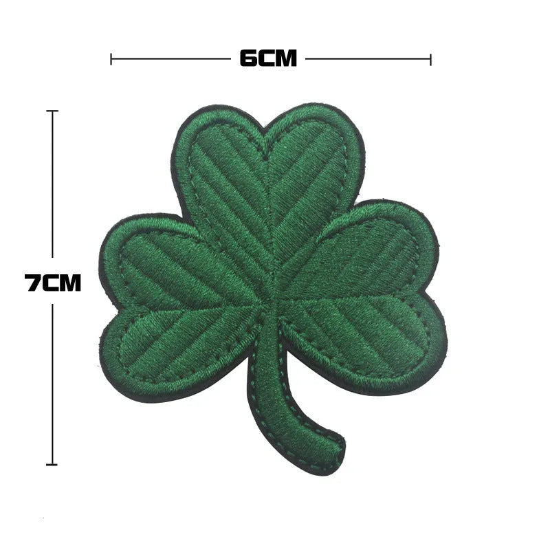 Embroidered fabric badge with hook and loop backing in various colour designs for industrial textile use