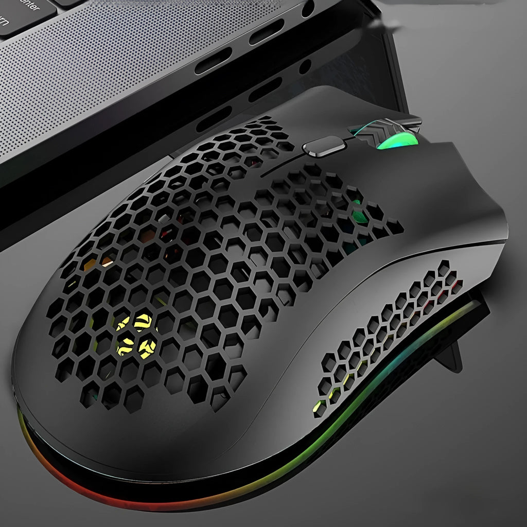 Hollow-out wireless gaming mouse with luminous charging feature in cyan colour.