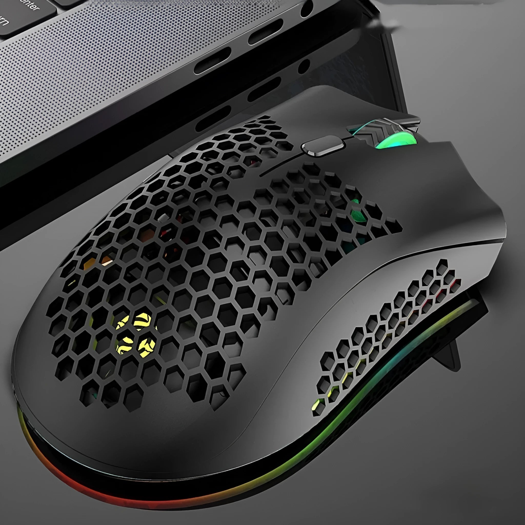 Hollow-out wireless gaming mouse with luminous charging feature in cyan colour.